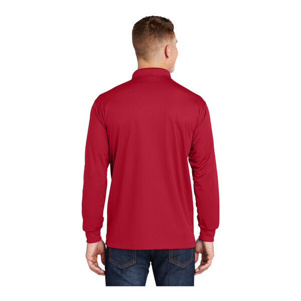 A man wearing a deep red long sleeve Sport-Tek polo shirt.