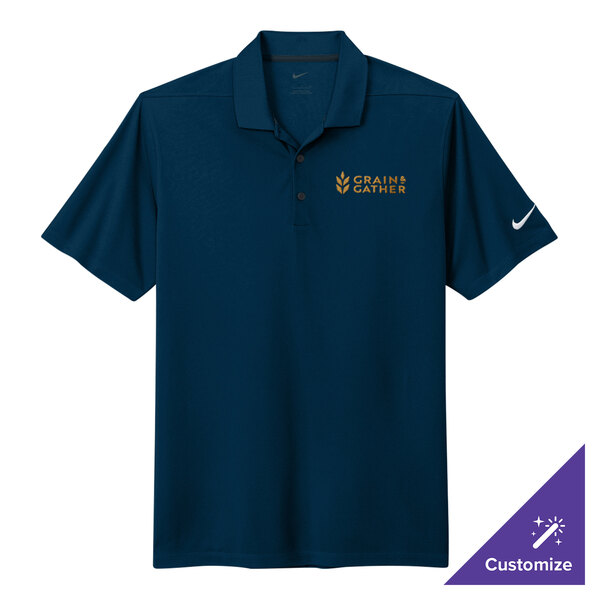 A Nike navy Dri-FIT polo shirt with a white swoosh on the sleeve.