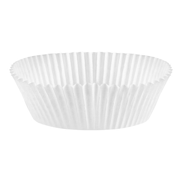 A close-up of a 3 1/2" x 1 1/2" white fluted jumbo baking cup.