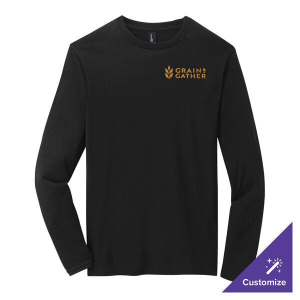 A black District long sleeve shirt with a gold and black logo on the front.