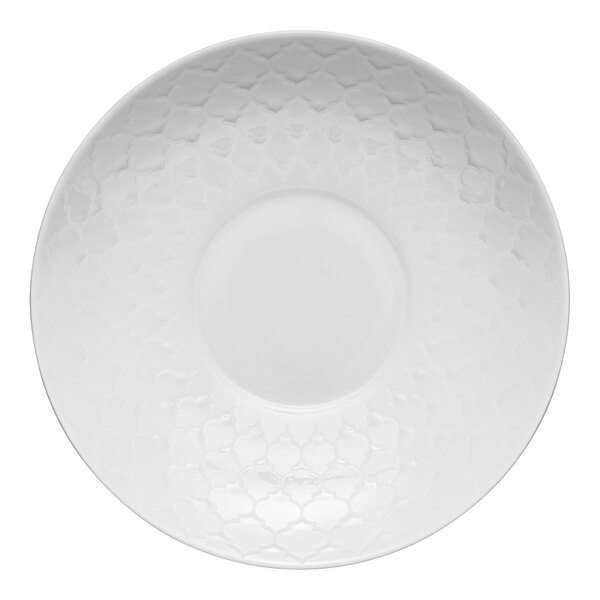 A close-up of a Libbey white deep coupe plate with a pattern on it.