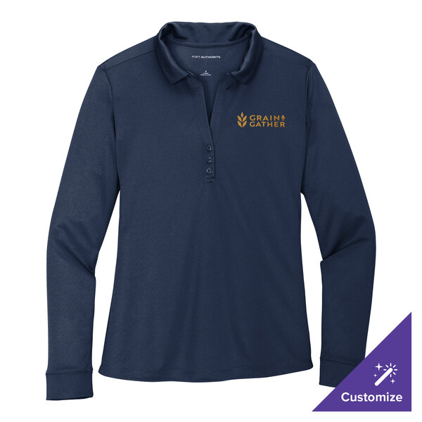 A navy women's long sleeve polo shirt with a logo on the front.