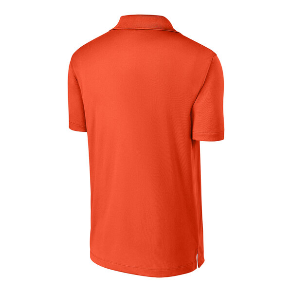A deep orange Sport-Tek short sleeve polo shirt.