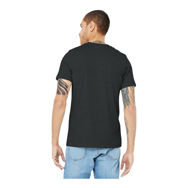 A man wearing a dark gray Bella + Canvas short sleeve t-shirt.