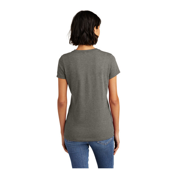 A woman wearing a District grey frost short sleeve t-shirt.