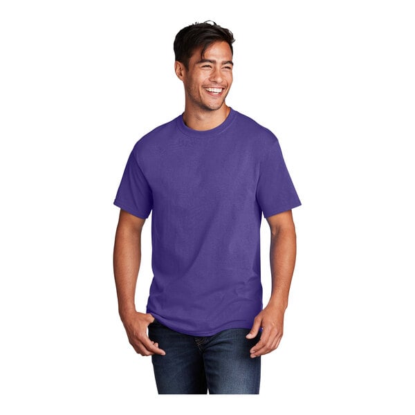 A man wearing a purple Port & Company Ultra-Soft T-Shirt.