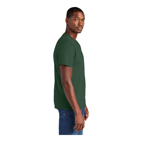 A man wearing a District forest green T-shirt.