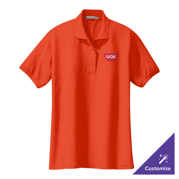 An orange Port Authority silk touch polo shirt with a logo on it.