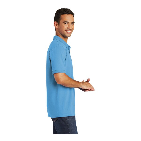 A man wearing a Port & Company Aquatic Blue polo shirt.