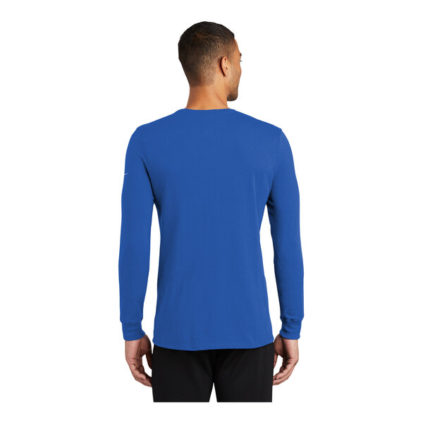 A man wearing a Nike blue long sleeve shirt.