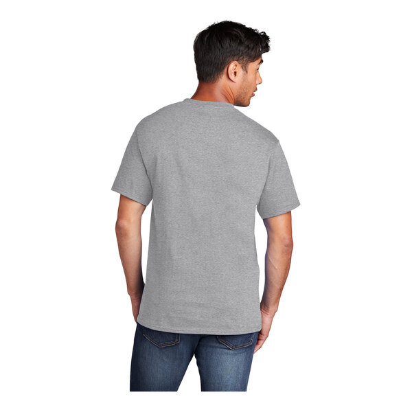 A man wearing a Port & Company athletic heather grey short sleeve t-shirt.