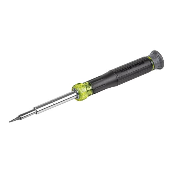 A close-up of a Klein Tools 14-in-1 Precision Screwdriver / Nut Driver with a black and green handle.
