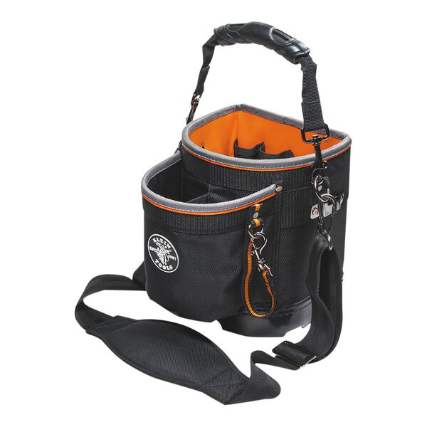 A black and orange Klein Tools shoulder tool pouch with 14 pockets.