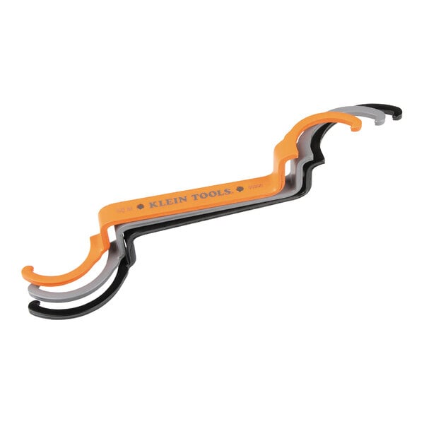 A set of black and orange Klein Tools locknut wrenches.