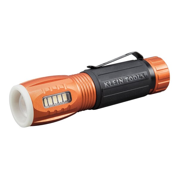 A Klein Tools flashlight with an orange light on it.