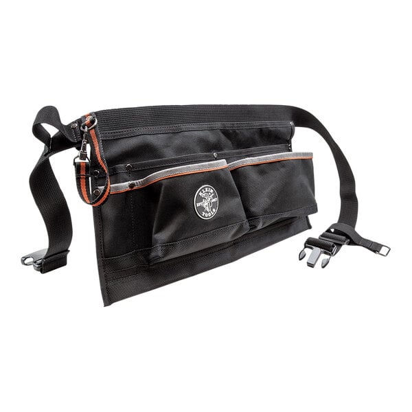 A black Klein Tools tool pouch apron with pockets.