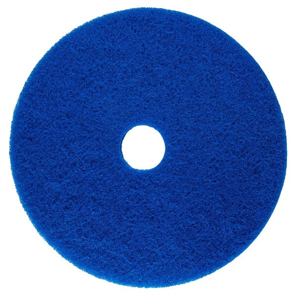 A blue circular Scrubble 53-19 floor pad with a hole in the middle.