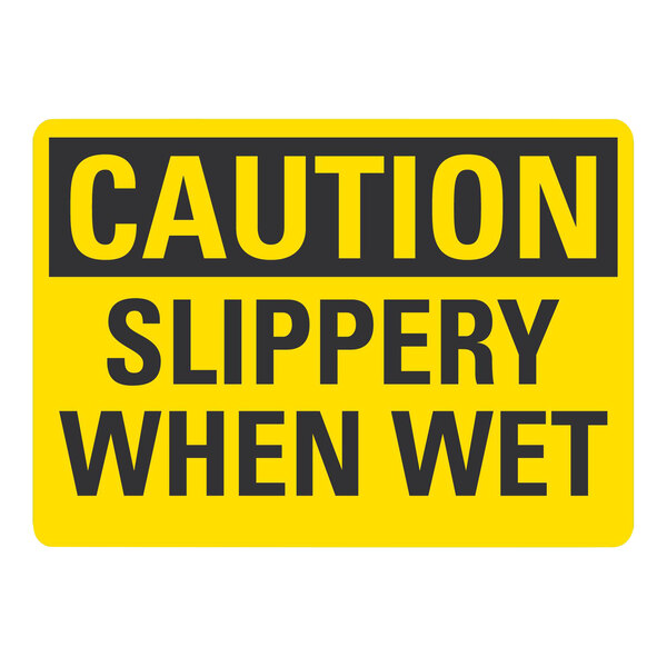 A yellow and black aluminum sign that says "Caution Slippery When Wet"