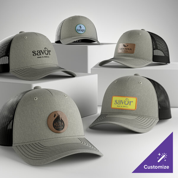 A collection of customizable heather gray and black 5-panel trucker caps with mesh backs, featuring various logo designs.