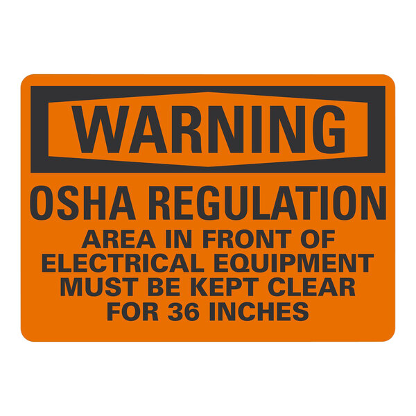 An orange warning sign with black text that says "Warning / OSHA Regulation / Area In Front Of Electrical Equipment Must Be Kept Clear"