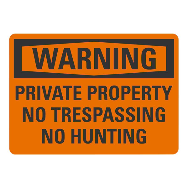 A black and orange plastic sign that says "Warning Private Property No Trespassing No Hunting"