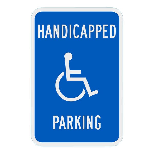 A blue sign with white text and a white symbol that says "Handicapped Parking" above the symbol.