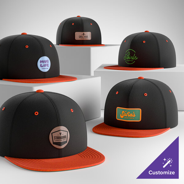 A customizable black and deep orange 6-panel flat bill snapback cap with a structured, high profile design.