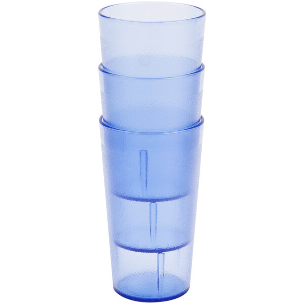 A stack of three Cambro slate blue plastic tumblers.