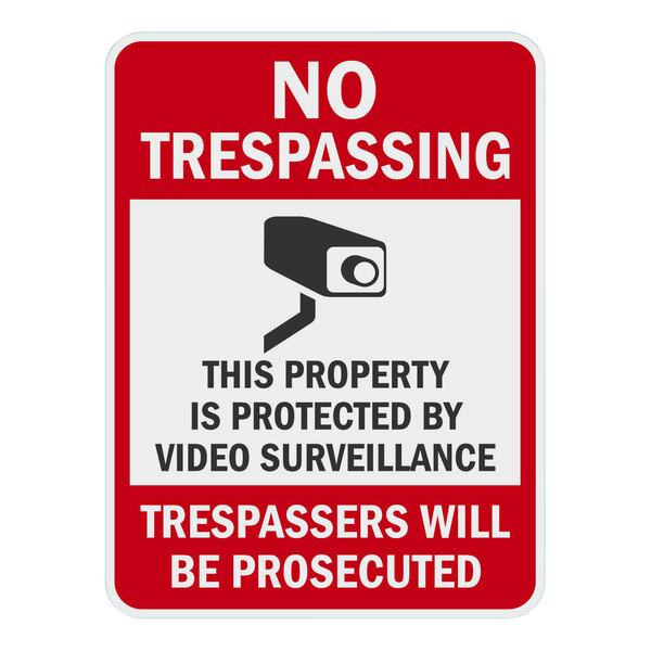 a red and white sign with a camera
