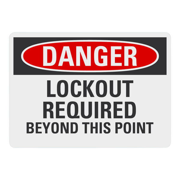 A white non-reflective aluminum sign that says "Danger Lockout Required Beyond This Point"