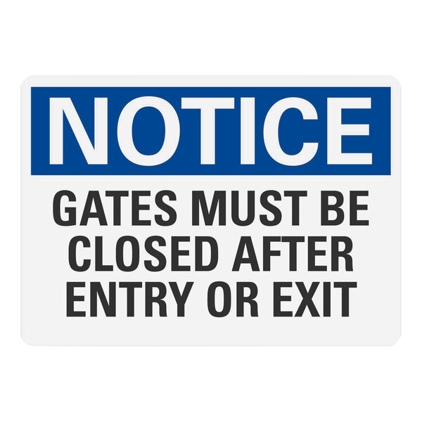 A white and blue plastic safety sign that says "Notice Gates Must Be Closed After Entry Or Exit" in black text.