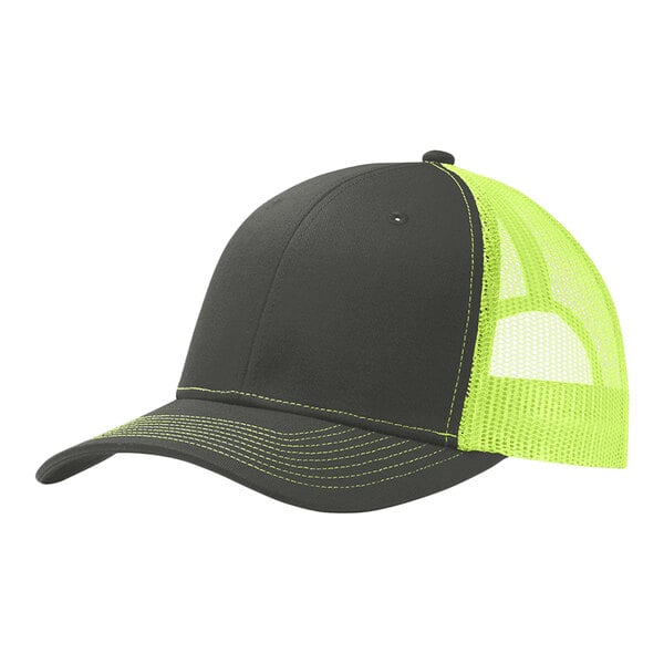 A grey and neon yellow Port Authority trucker cap with a mesh back.