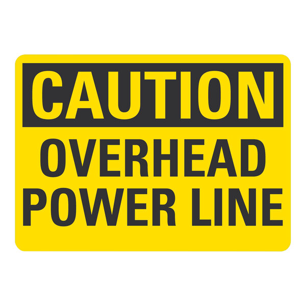 A yellow rectangular Lavex safety label with black text reading "Caution Overhead Power Line"