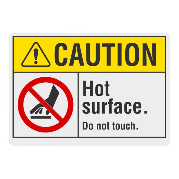 A yellow and black plastic Lavex "Caution / Hot Surface / Do Not Touch" sign on a counter.