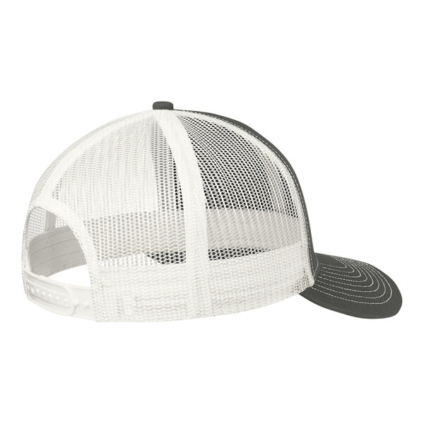 A Port Authority grey and white trucker cap with mesh back.