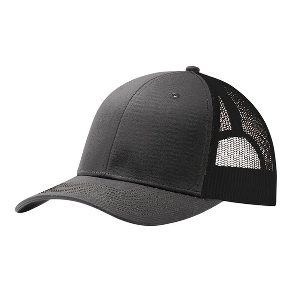A black Port Authority trucker cap with black and white mesh.