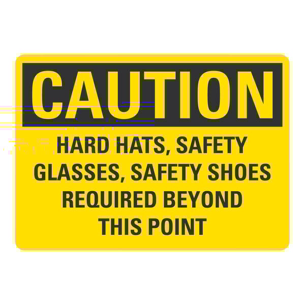 A yellow and black Lavex safety label with the text "Caution / Hard Hats, Safety Glasses Required Beyond This Point"