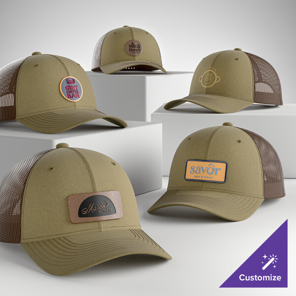 A collection of customizable khaki and coffee mesh-back trucker caps with various logo patches displayed on a white background.