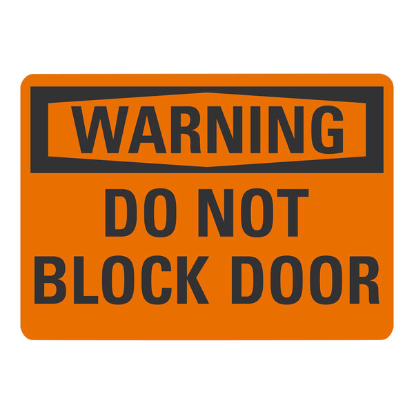 A white rectangular aluminum warning sign with black text reading "Warning / Do Not Block Door" 