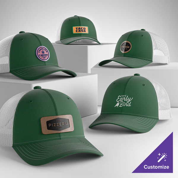 A collection of customizable forest green and white 6-panel trucker caps with mesh backs, displayed on white platforms.