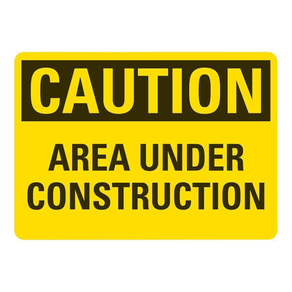 A yellow Lavex aluminum sign with black text that says "Caution Area Under Construction"