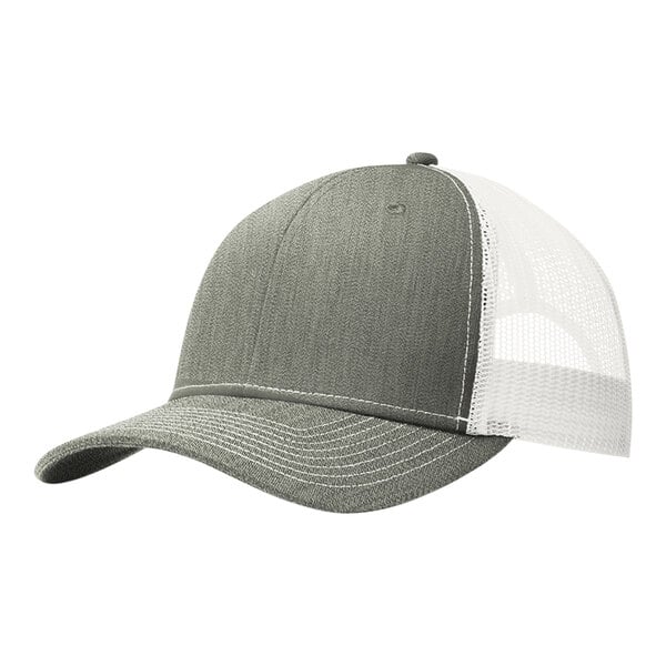 A Port Authority trucker cap with a heather grey front and white mesh back.