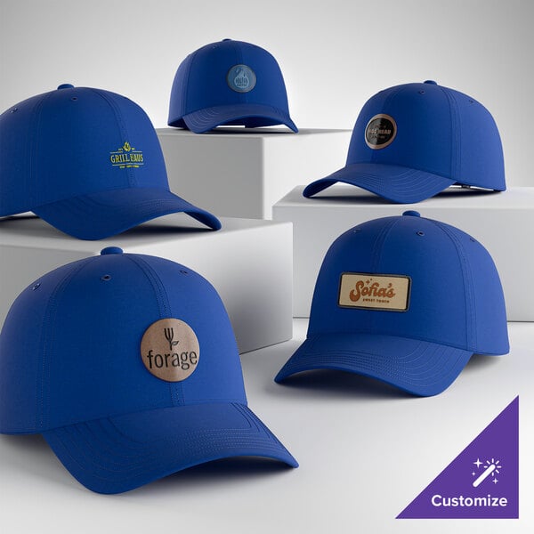 A collection of royal blue unstructured, low profile 6-panel dad caps with customizable patches on the front.