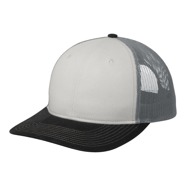 A white and black trucker cap with a mesh back.