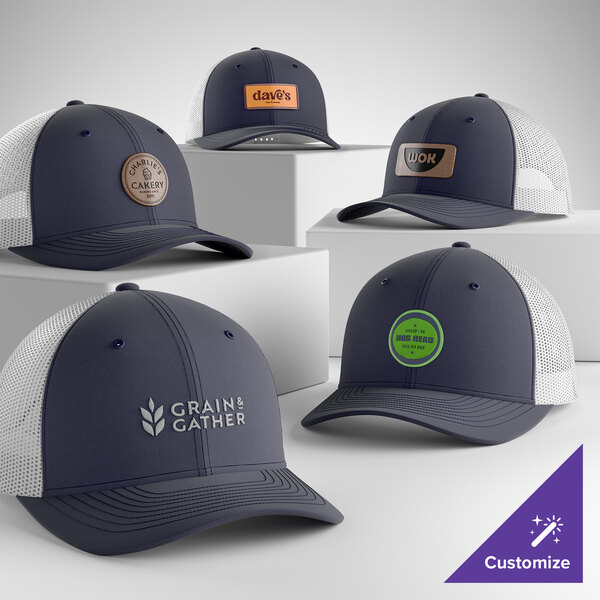 A customizable navy and white 6-panel trucker cap with a mesh back and structured, mid-profile design.