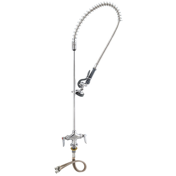 A stainless steel Advance Tabco pre-rinse faucet with a hose attached.