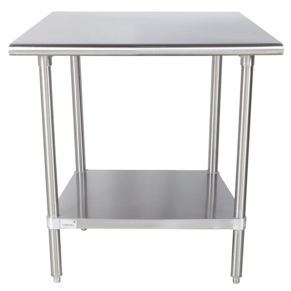 An Advance Tabco stainless steel work table with a stainless steel undershelf.