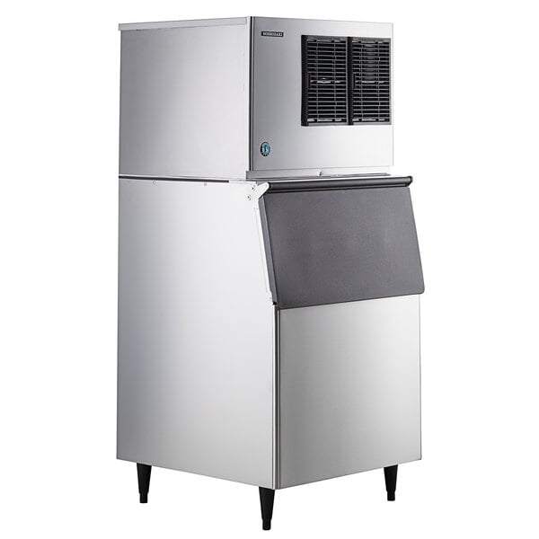 A large silver rectangular Hoshizaki air cooled ice machine with a black door.