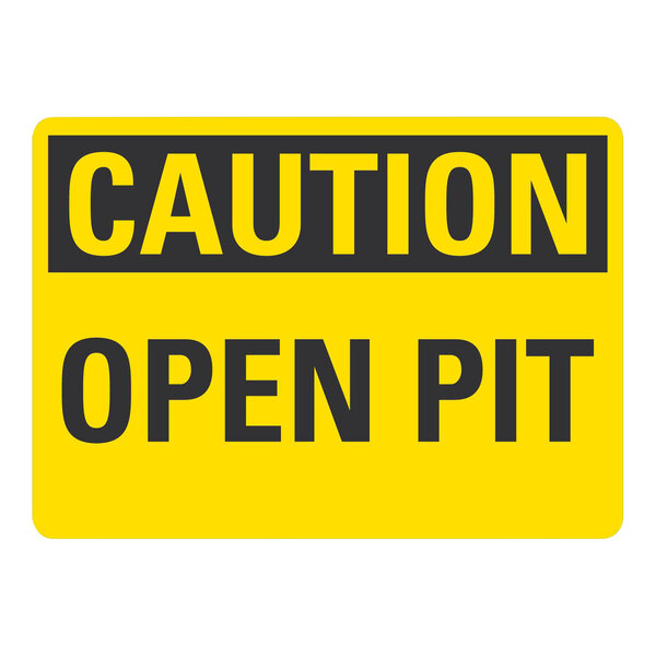 A yellow and black rectangular aluminum sign that says "Caution / Open Pit"