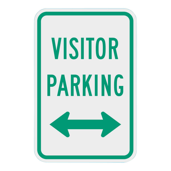 A white and green sign that says "Visitor Parking" with double arrows.